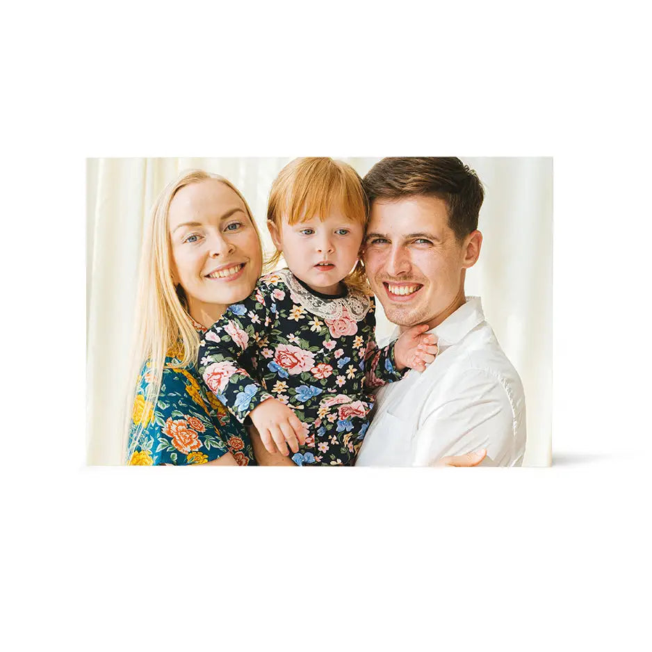 Happy family portrait showcasing laser engraving and digital printing on Shopify platform