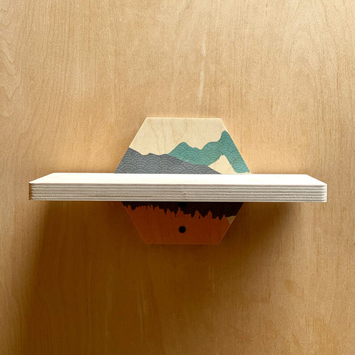 Hexagonal mountain-themed wall shelf, a stylish and sturdy wall shelf for your space