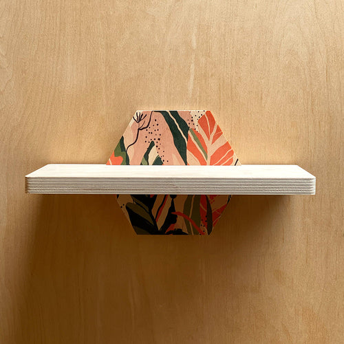 Hexagonal sturdy wall shelf with floral pattern for nature-inspired interiors